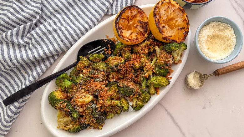 Roasted broccoli in a dish with lemon