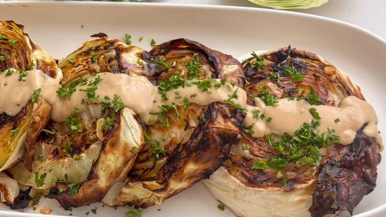 Cabbage steaks with miso tahini drizzle