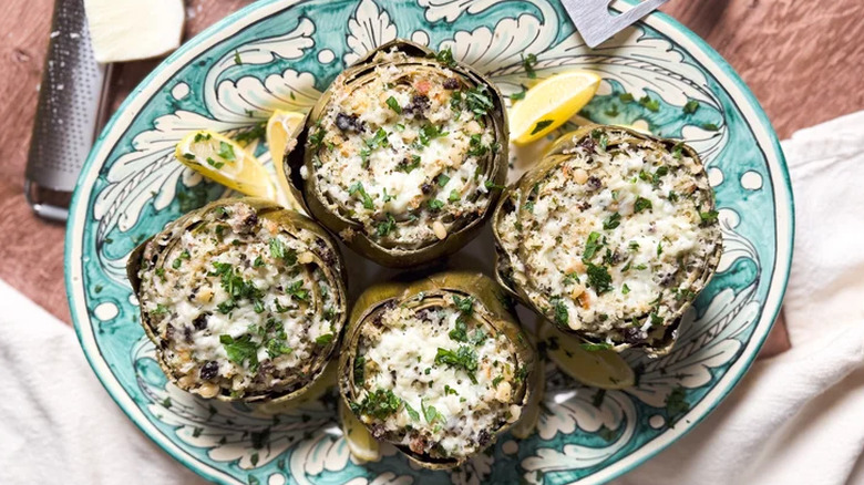 Artichokes on a plate with lemon