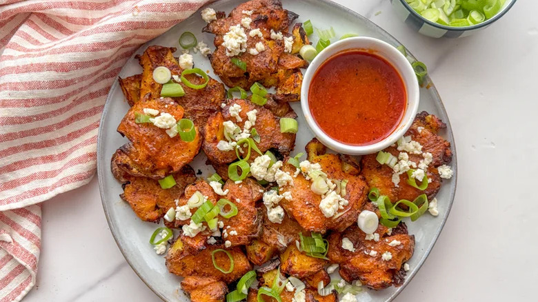 Smashed Buffalo potatoes on a plate