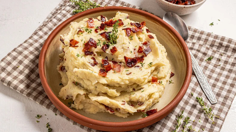 Mashed potatoes in a bowl with a spoon
