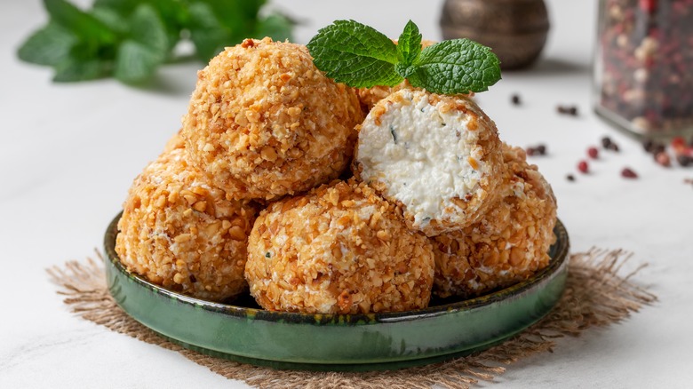Cream cheese balls with nuts and mint