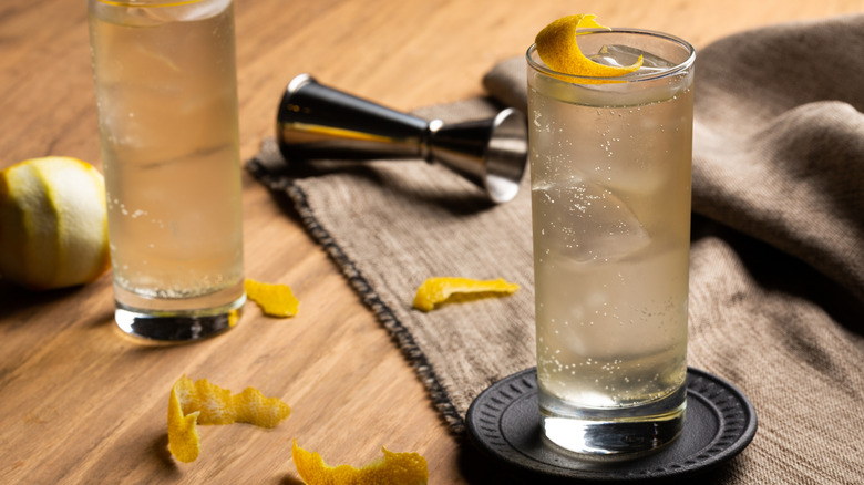 two glasses of Japanese whiskey highballs with lemon peels