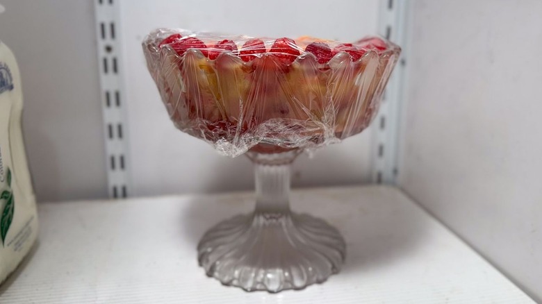 3-ingredient raspberry lemonade British trifle covered with plastic in refrigerator