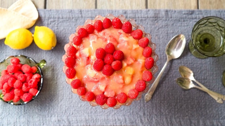 3-ingredient raspberry lemonade British trifle top view on table with lemons and berries