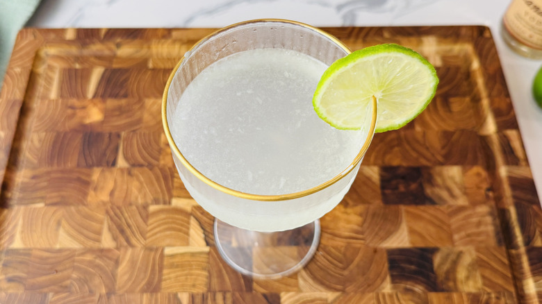 Vodka gimlet with lime wheel garnish