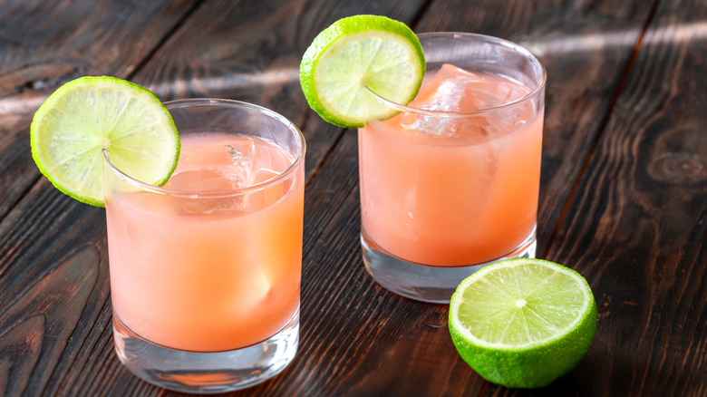 Refreshing iced cocktail or mocktail with guava, lime, and ice