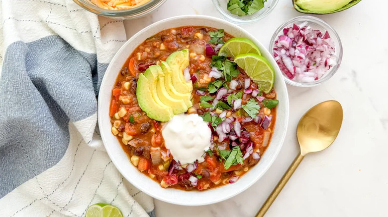 Vegetarian chili in a bowl with a spoon