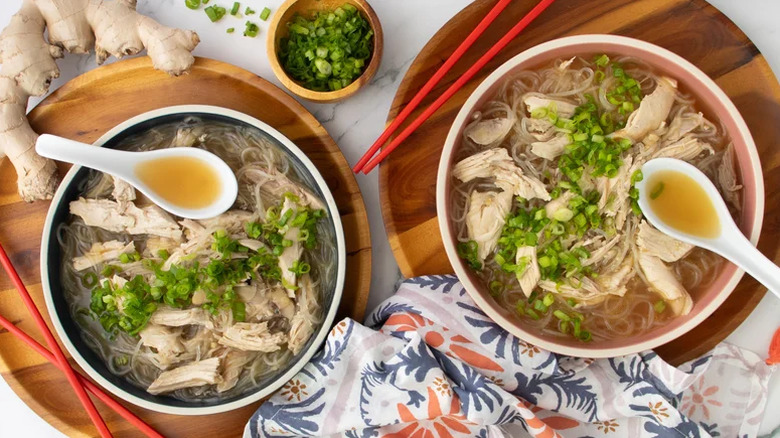Chicken long rice in a bowl with spoons