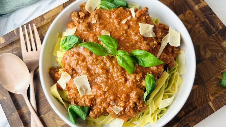 Bowl of pasta with cheese and sauce