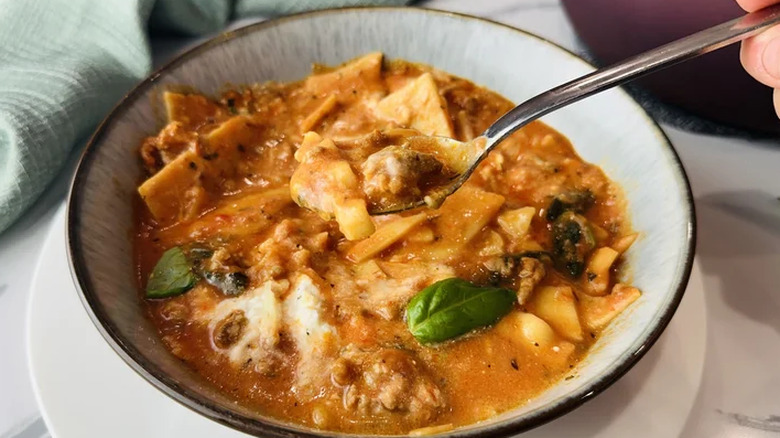 Bowl of soup with a spoon