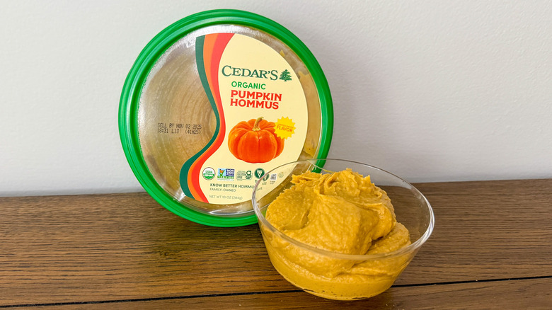 Round container of Cedar's pumpkin hommus