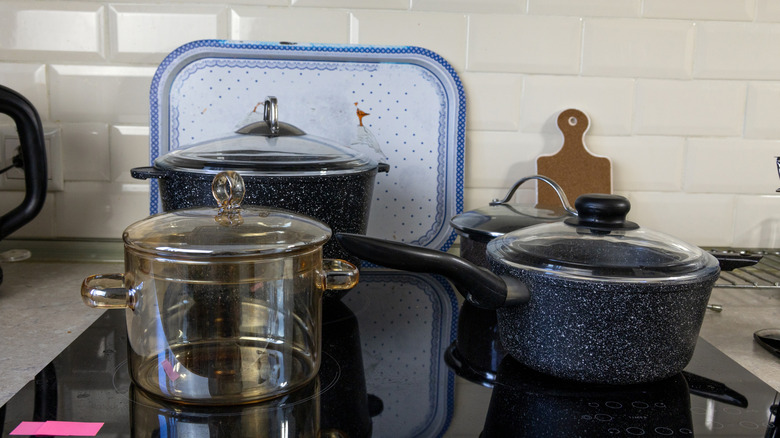 Different types of cookware on an induction cooktop