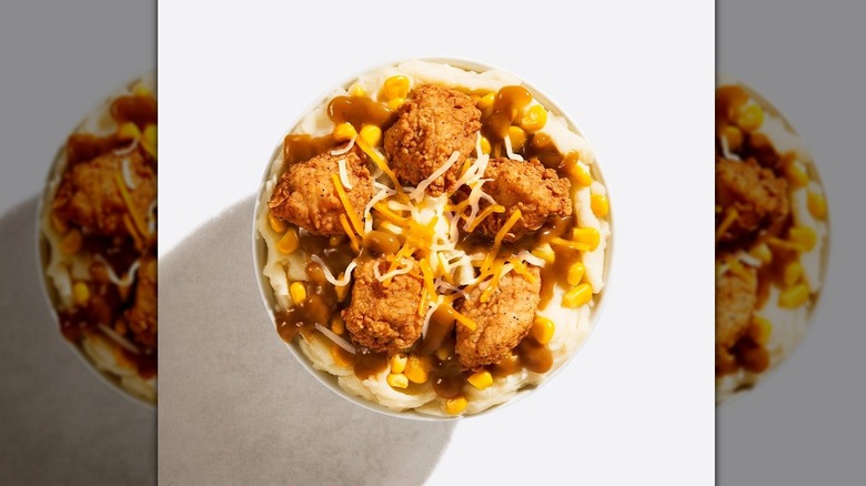 Top-down view of KFC famous bowl on a white background