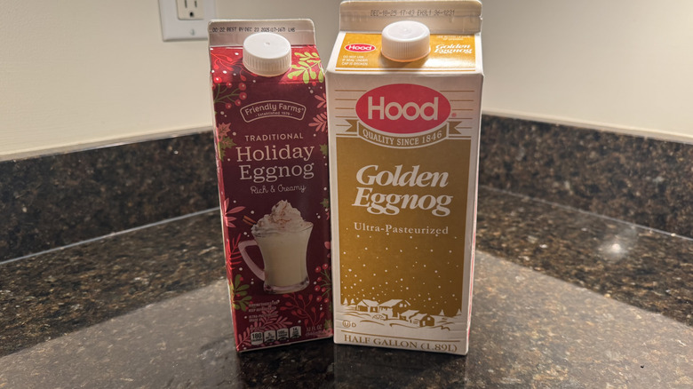 Two cartons of eggnog on countertop