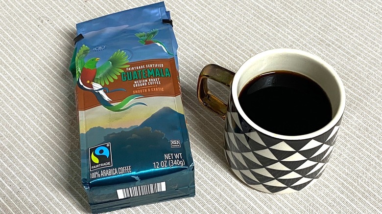 Aldi Guatemala coffee in bag with a cup of brewed coffee
