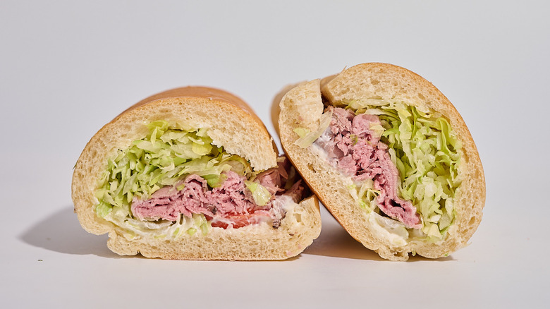 A sliced jimmy john's sandwich on a table