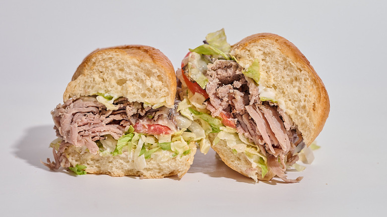 Firehouse sub sliced in half on a table