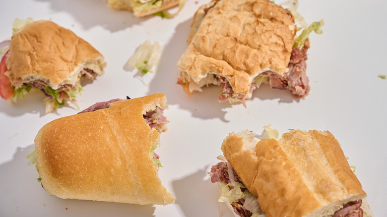 Half-eaten sandwiches on a table