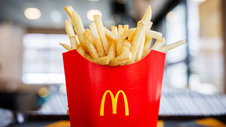 A red sleeve of McDonald's French fries