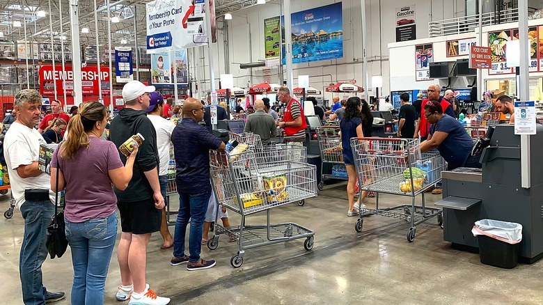 Costco customers in line in the express checkout area