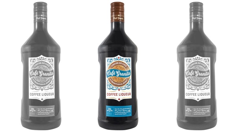 A bottle of Cafe Granita coffee liqueur flanked by two faded black and white versions of the same bottle