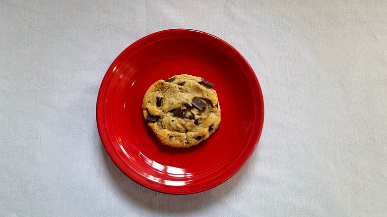 Costco's chocolate chunk cookie on a red plate