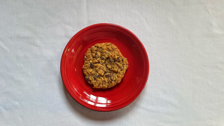 Costco's oatmeal raisin cookie on a red plate