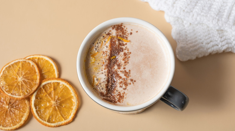 Hot cocoa with dried oranges, orange zest, and chile powder