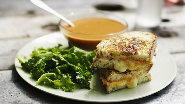 Grilled cheese sandwich, salad and soup