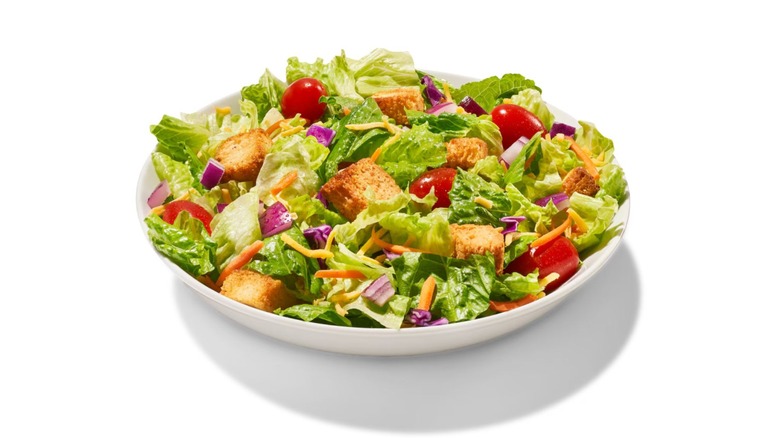 A Domino's salad against a white background