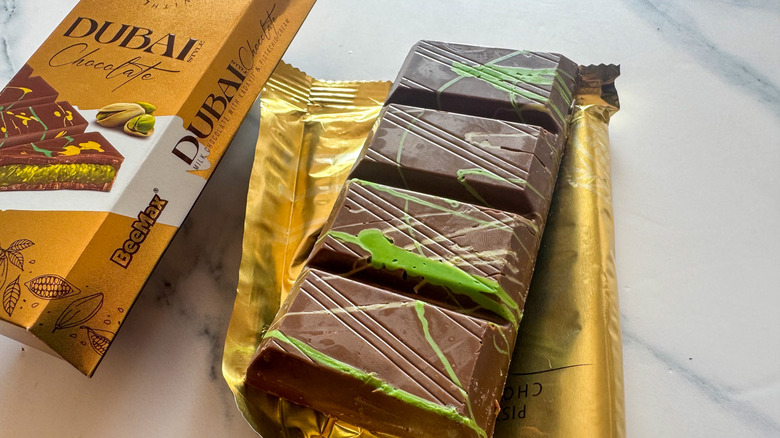 Colored Dubai chocolate bar on marble surface