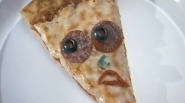 Pizza Hut's Pizza Head mascot.