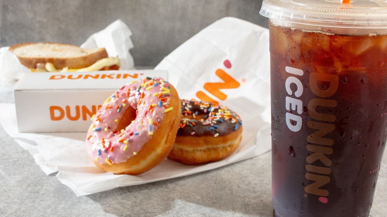 Dunkin' doughnuts and coffee on counter