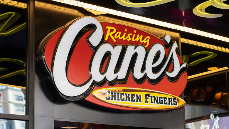 A Raising Cane's sign outdoors