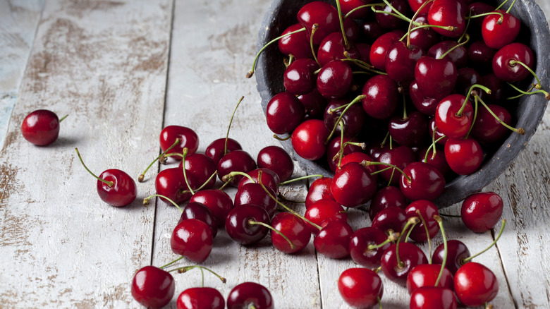 toppled bowl of fresh cherries