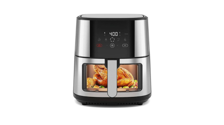 Digital 8 Quart Air Fryer on white background showing chicken on inside.