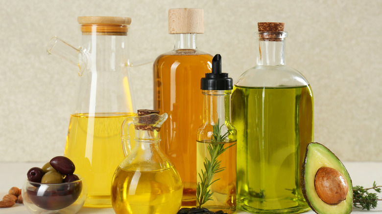 A variety of cooking oils in bottles of differing shapes and sizes