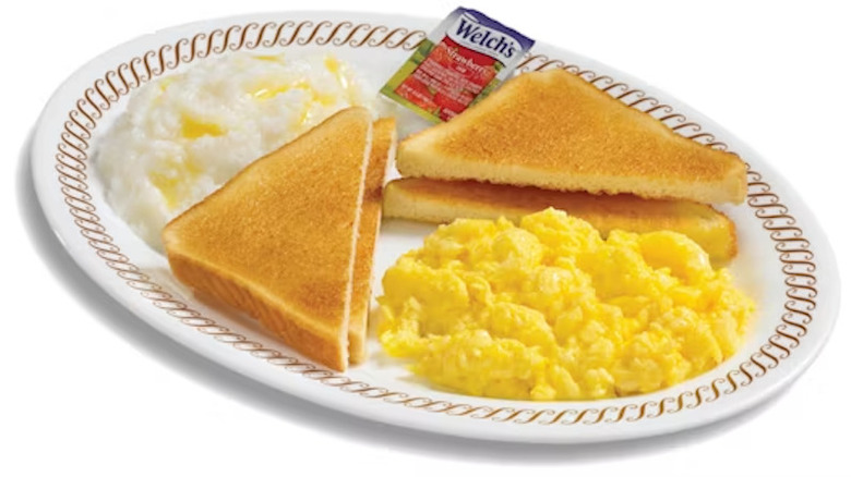 a plate of waffle house eggs, toast, and grits