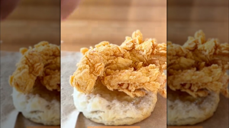 Popeyes chicken tender on biscuit