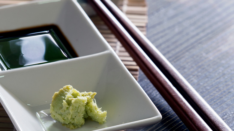 Soy sauce, wasabi, and chopsticks