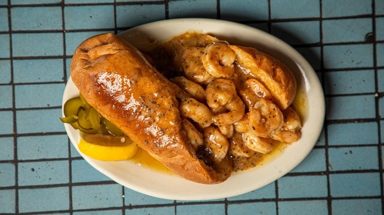 Overhead image of the BBQ shrimp po' boy at Liuzza's by the Track