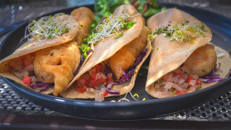 Fried fish tacos on a plate