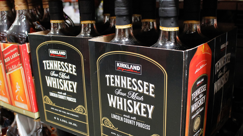Bottles of Kirkland Tennessee whisky on store shelf.