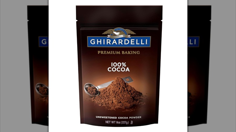 Bag of cocoa powder on white background