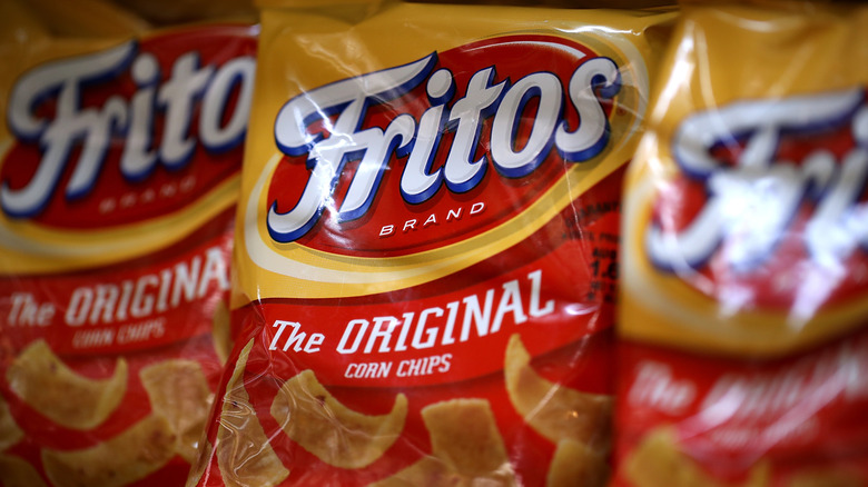 a close up picture of three bags of Fritos side by side
