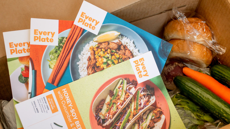 Open box with ingredients and recipe cards from EveryPlate