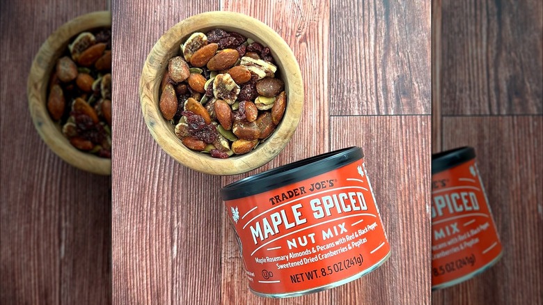 Container of Trader Joe's Maple-Spiced Nut Mix on a wooden surface