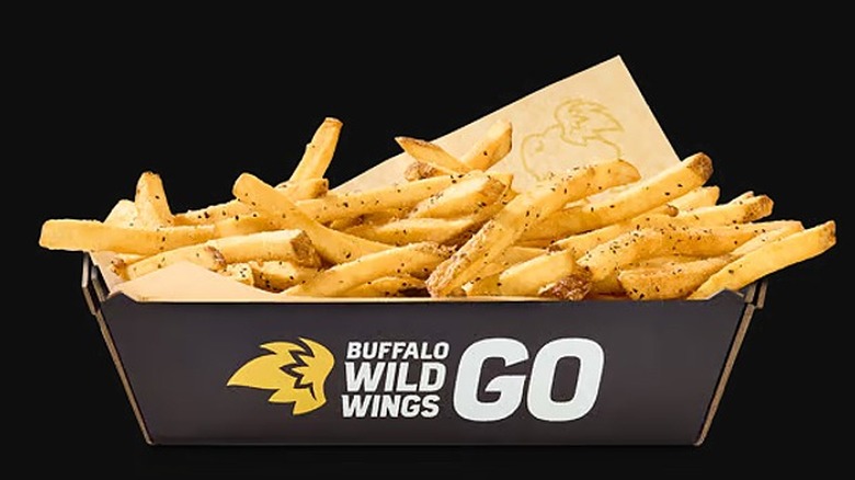 Basket of Buffalo Wild Wings French Fries on a black background