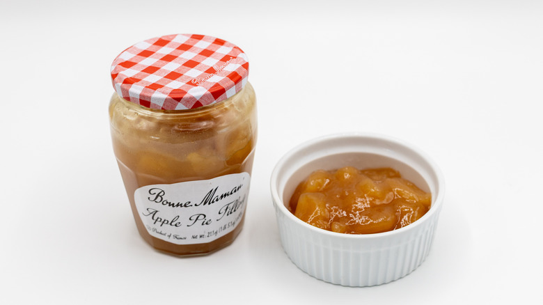 Jar of Bonne Maman pie filling with ramekin
